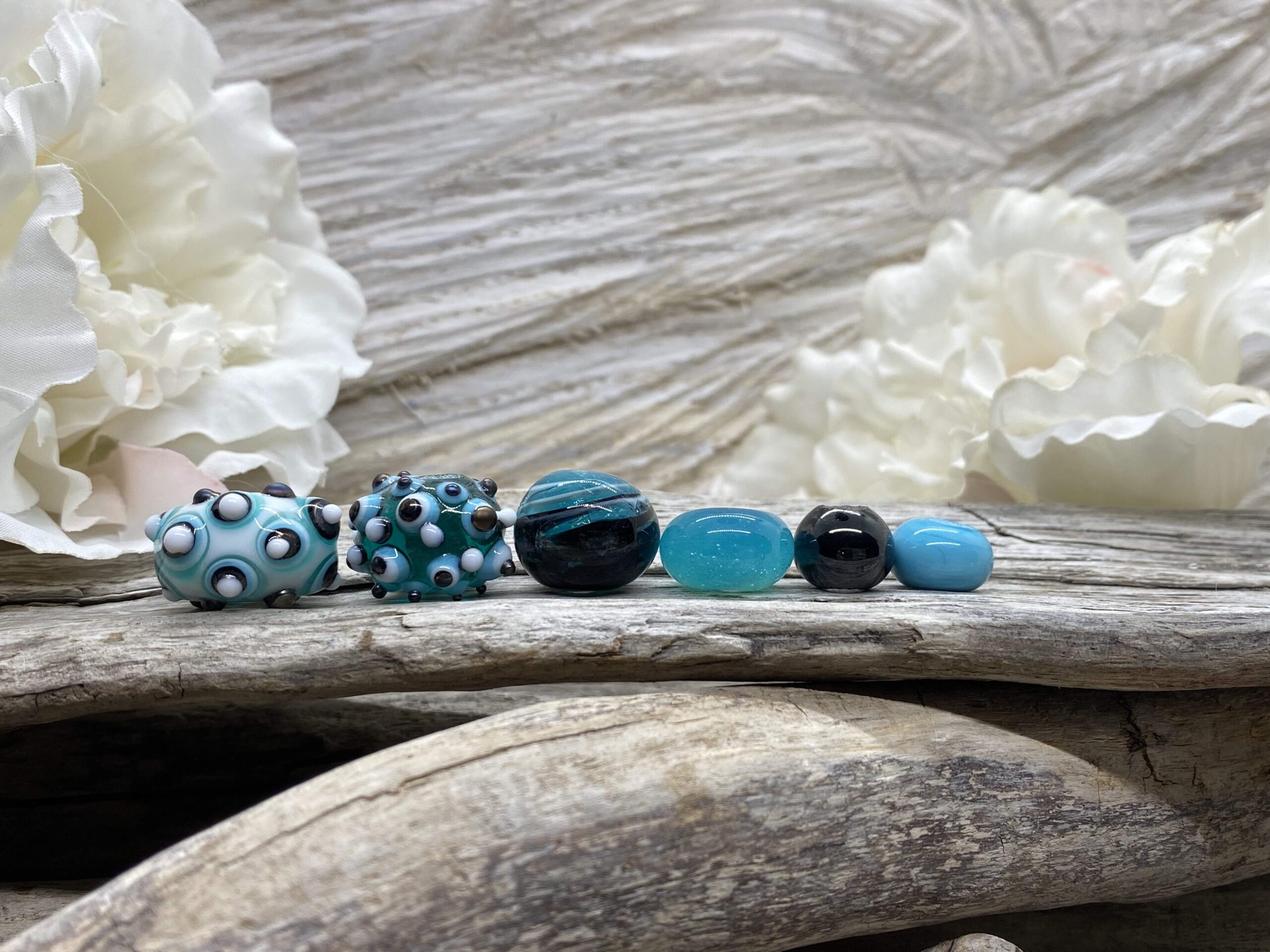 250 Glasperlen drehen